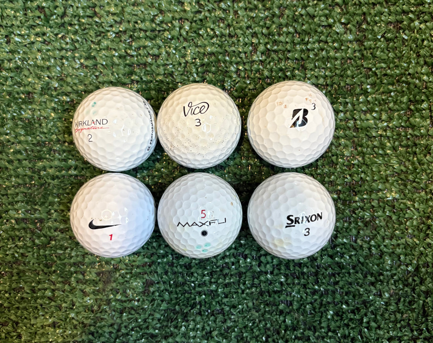 24 Kirkland, Vice, Bridgestone, Nike, Maxfli, Srixon golf balls assorted